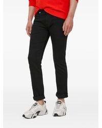 Guess - Logo-plaque Jeans - Lyst