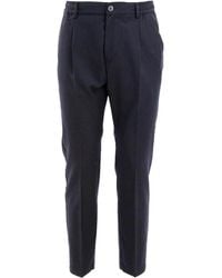 Cruna - Pleated-front Trousers - Lyst