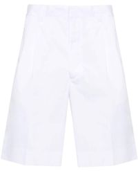 Prada - Popeline-Shorts mit Logo-Patch - Lyst