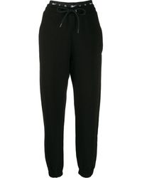 Reebok X Victoria Beckham Track pants and sweatpants for Women - Up to ...