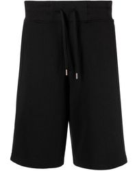 Versace - Pantalones cortos de deporte con aplique del logo - Lyst