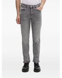 KARL LAGERFELD - Logo-Patch Whiskered Jeans - Lyst