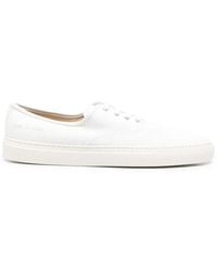 Common Projects - Four Hole Lace-Up Sneakers - Lyst