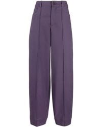 Aeron - Tapered-Leg Wool Trousers - Lyst