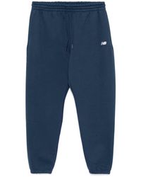 New Balance - Logo-Embroidered Track Pants - Lyst