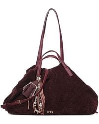 V73 - Sac Porté Épaule À Breloque Frangée Et Plaque Logo - Lyst