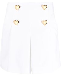 Moschino - Heart-shaped Button Detail Shorts - Lyst