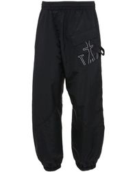 JW Anderson - Anchor-embroidered Twisted Track Pants - Lyst