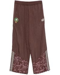 PUMA - King Logo-Print Track Pants - Lyst
