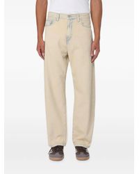 Carhartt - Logo-Patch Straight-Leg Jeans - Lyst