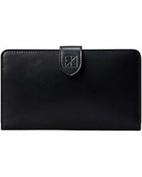 Calvin Klein - Leather Passport Wallet - Lyst