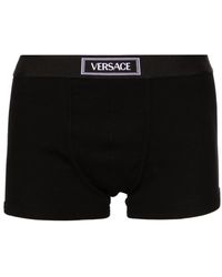 Versace - Shorts mit Logo-Bund - Lyst