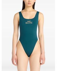 New Balance - Trackside Bodysuit - Lyst