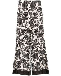 Sandro - Floral-Print Trousers - Lyst