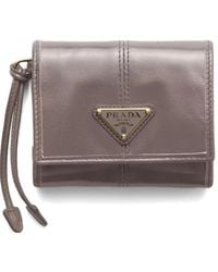Prada - Cartera Pequeña Con Logo Triangular - Lyst