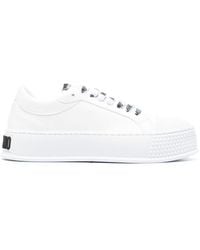 Moschino - Embossed-logo Faux-leather Sneakers - Lyst
