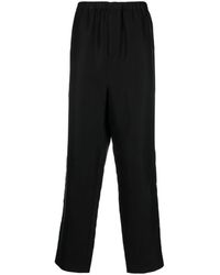 Saint Laurent - Pantalones ajustados de talle alto - Lyst