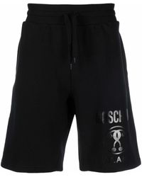 Moschino - Pantalones cortos de chándal con logo - Lyst
