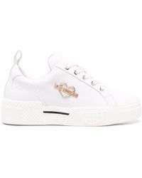 Love Moschino - Sneakers con placca logo - Lyst