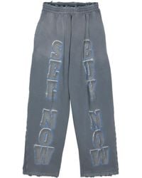 Balenciaga - Slogan-Print Cotton Track Pants - Lyst