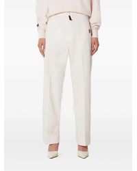 Fila - Logo-Patch Trousers - Lyst