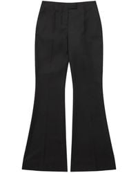 MATIERES FECALES - Flared Wool Trousers - Lyst