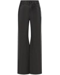 TRUE AVENUE - Logo-Patch Leather Trousers - Lyst