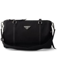 Prada - Large Re-Nylon And Saffiano Leather Duffel Bag - Lyst