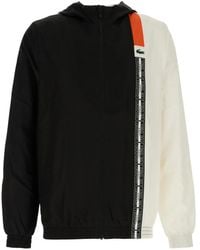 Lacoste - Chaqueta de algodón con capucha - Lyst