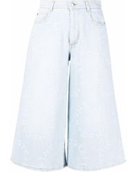 Stella McCartney - Jupe-culotte en jean effet-usé à logo Stella - Lyst