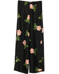 Nanushka - Pantaloni Arvenn Con Stampa Rose E Vita Elasticizzata - Lyst