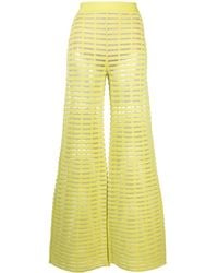 Genny - Semi-Sheer Flared Trousers - Lyst