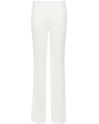 Genny - Pantalon Droit À Plis Marqués - Lyst