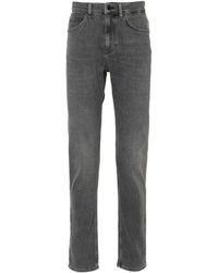 BOSS - Tapered-Jeans mit Logo-Patch - Lyst
