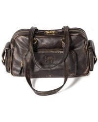 Miu Miu - Bolso shopper Pocket con logo en relieve - Lyst