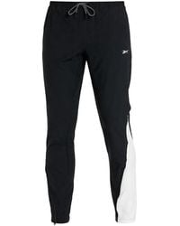 Reebok - Logo-Detail Track Pants - Lyst