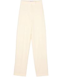 Chiara Ferragni - Crepe Pressed-Crease Tapered Trousers - Lyst
