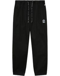 KTZ - Logo-Patch Cuffed Track Pants - Lyst