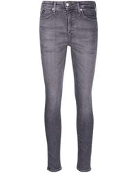 Calvin Klein - Slim-cut Mid-rise Jeans - Lyst