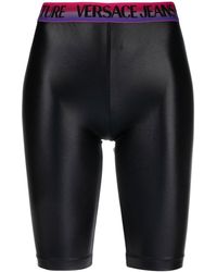 Versace - Shorts da ciclismo con banda logo - Lyst