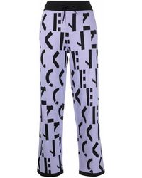 KENZO - All-over Logo-print Trousers - Lyst
