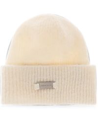 Canada Goose - Logo-Appliqué Ribbed-Knit Beanie Hat - Lyst