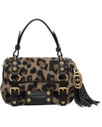 La Carrie - Cabas Clouté À Imprimé Animalier - Lyst