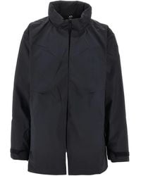 Oakley - High-Neck Rain Coat - Lyst