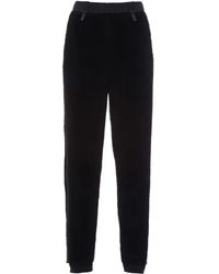 Prada - Pantalones con logo estampado - Lyst