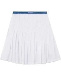 Gcds - Logo-Detail Pleated Mini Skirt - Lyst