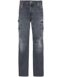 Balmain - Jeans mit aufgesetzten Taschen im Distressed-Look - Lyst