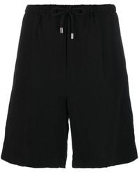 Totême - Pantalones cortos con cordones - Lyst