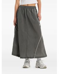 New Balance - Sport Legacy Piped Ripstop Skirt - Lyst