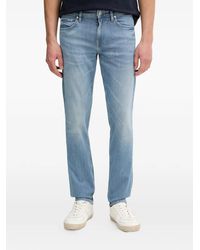 Guess - Logo Patch Denim Jeans - Lyst